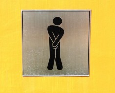 Man urinating sign